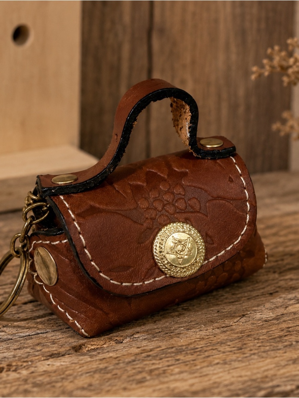 Brown Embossed Leather Mini Handbag Keychain with Gold Accent